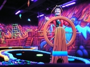 Come and get your Holiday GLOW on at A Putt Above